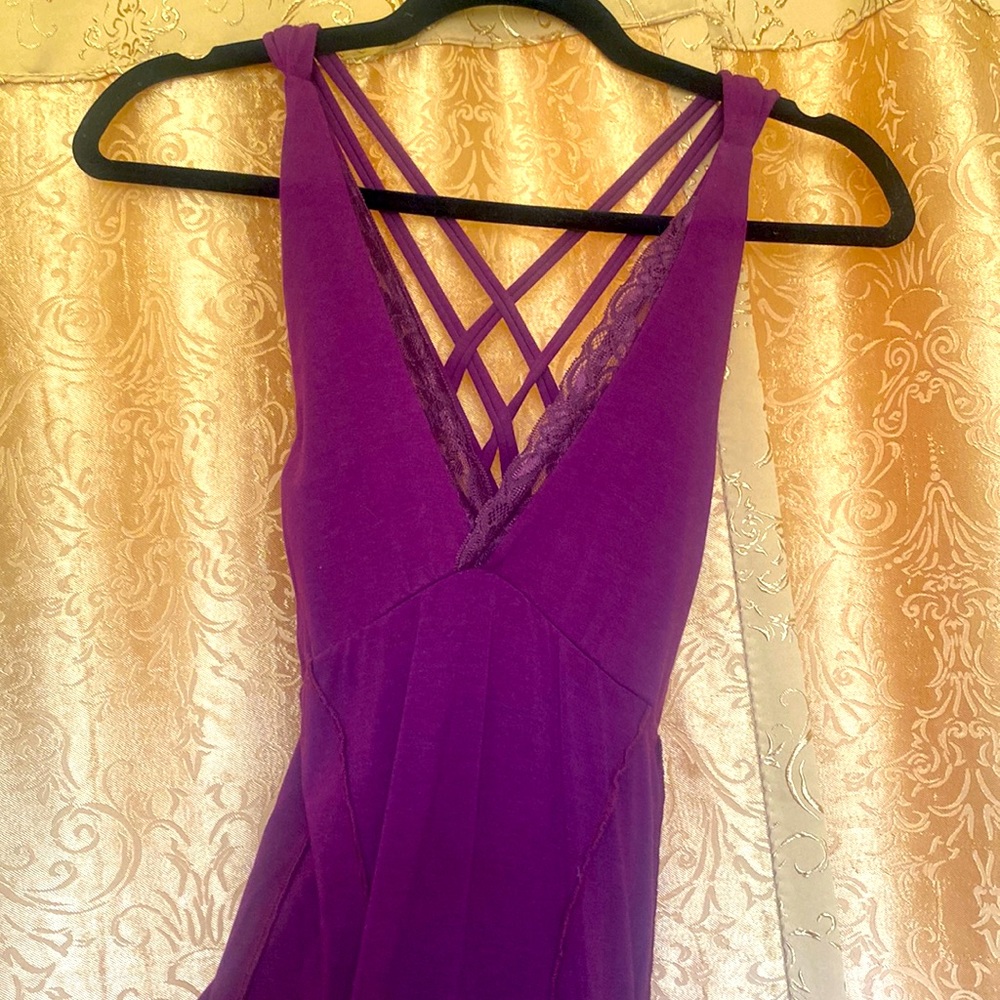 Brand new. Worn once. Organic cotton plum super soft, super sexy dress. Size M